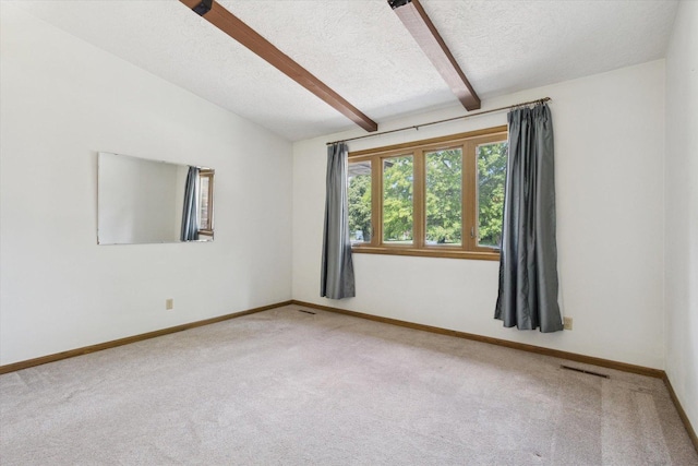 1619 Arnold Ave, Rockford, IL 61108 - carpeted spare room with a textured ceiling and baseboards