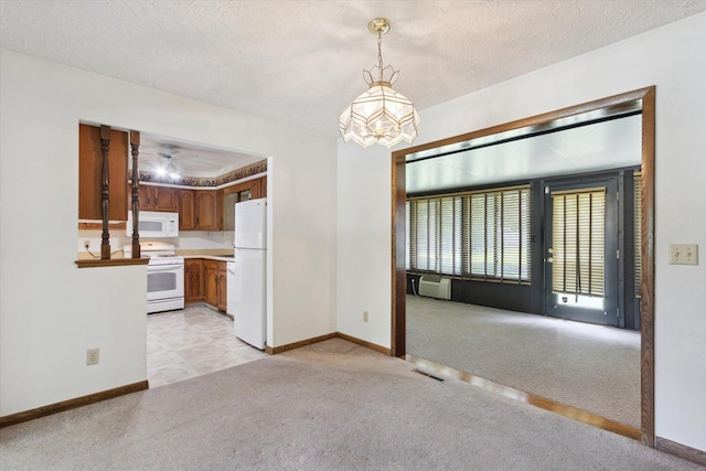 1619 Arnold Ave, Rockford, IL 61108 - unfurnished living room with light carpet, a chandelier, a ceiling fan, an AC wall unit, and a textured ceiling