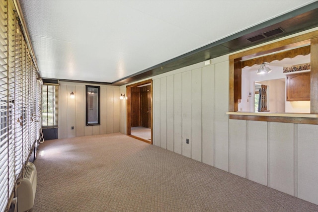 1619 Arnold Ave, Rockford, IL 61108 - spare room with carpet and a decorative wall