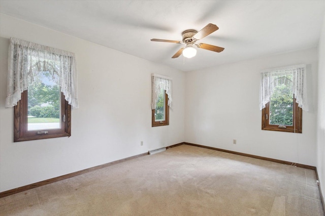 1619 Arnold Ave, Rockford, IL 61108 - empty room featuring light colored carpet and ceiling fan