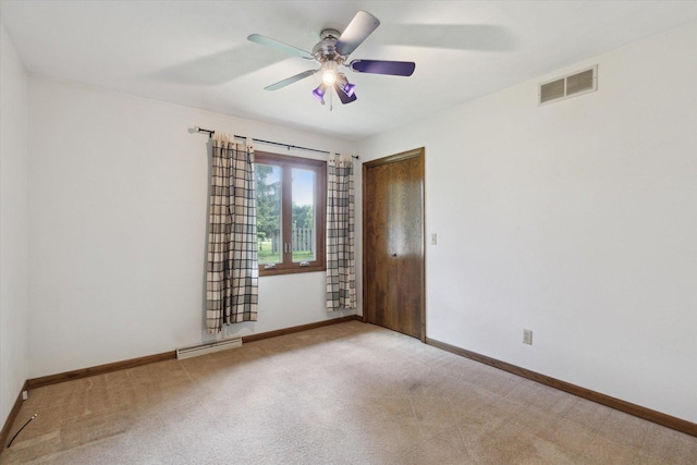 1619 Arnold Ave, Rockford, IL 61108 - unfurnished room featuring carpet flooring and ceiling fan