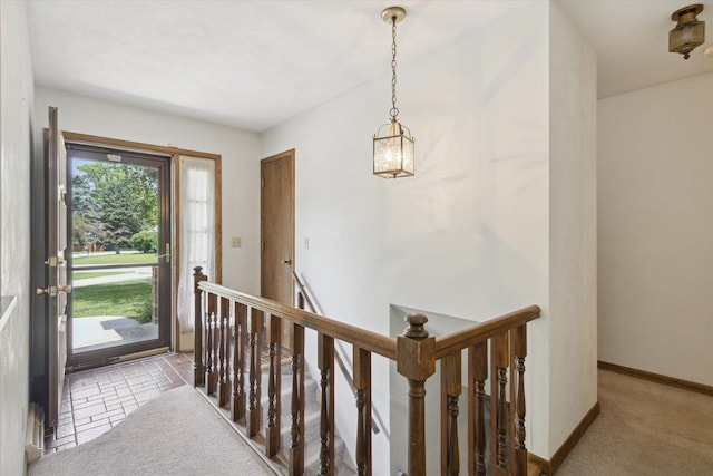 1619 Arnold Ave, Rockford, IL 61108 - hall featuring an upstairs landing and baseboards
