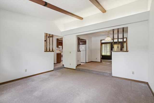 1619 Arnold Ave, Rockford, IL 61108 - carpeted spare room featuring beamed ceiling and baseboards