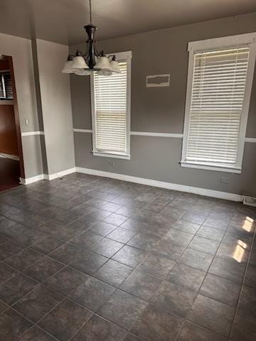 24 E 137th St, Riverdale, IL 60827 - unfurnished dining area with a chandelier and healthy amount of natural light