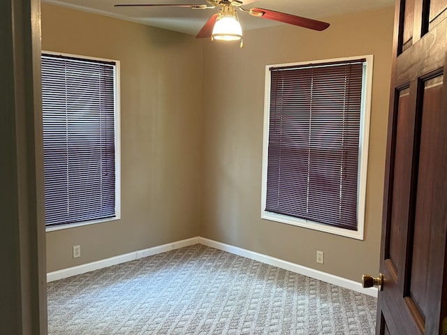 541 W Grove St, Bloomington, IL 61701 - spare room featuring carpet and ceiling fan