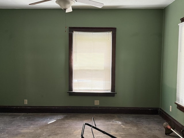 541 W Grove St, Bloomington, IL 61701 - unfurnished room with ceiling fan and wood finished floors