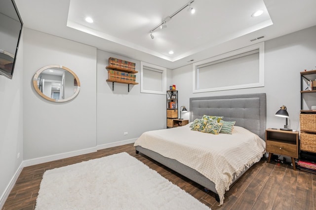 2422 W Lyndale St Unit 1E, Chicago, IL 60647 - bedroom with a tray ceiling, wood finished floors, and recessed lighting