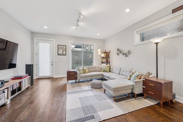 2422 W Lyndale St Unit 1E, Chicago, IL 60647 - living room featuring wood finished floors, rail lighting, and recessed lighting