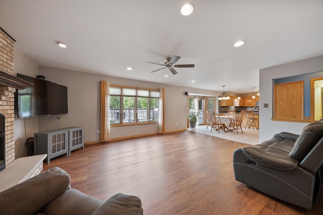 19600 Brookridge Dr, Tinley Park, IL 60487 - living room with a fireplace, a ceiling fan, wood finished floors, and recessed lighting
