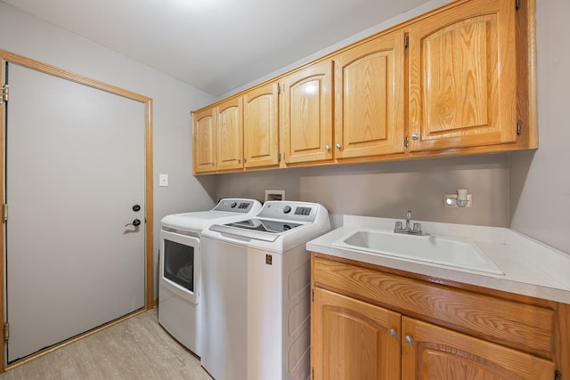 19600 Brookridge Dr, Tinley Park, IL 60487 - laundry area featuring cabinet space, washing machine and clothes dryer, and light wood finished floors