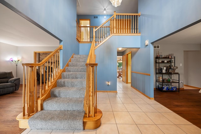 19600 Brookridge Dr, Tinley Park, IL 60487 - stairs featuring a high ceiling and wood finished floors