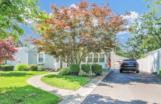411 Hessel Blvd, Champaign, IL 61820 - obstructed view of property featuring asphalt driveway