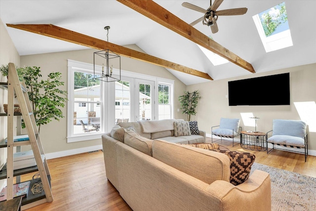 411 Hessel Blvd, Champaign, IL 61820 - living area with a skylight, a ceiling fan, and light wood-style flooring