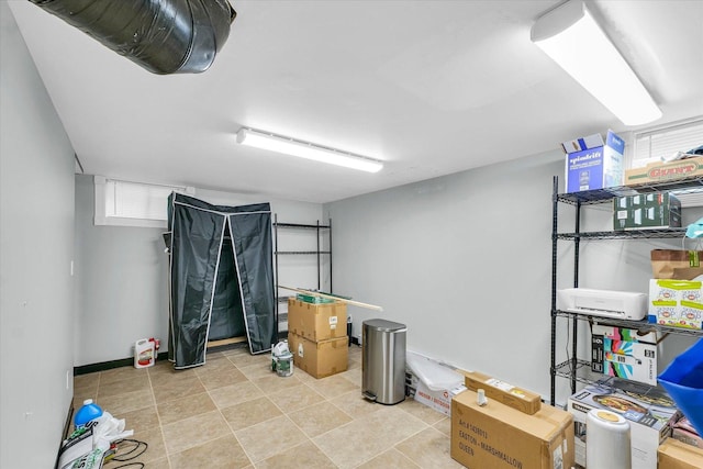 411 Hessel Blvd, Champaign, IL 61820 - finished below grade area featuring light tile patterned flooring
