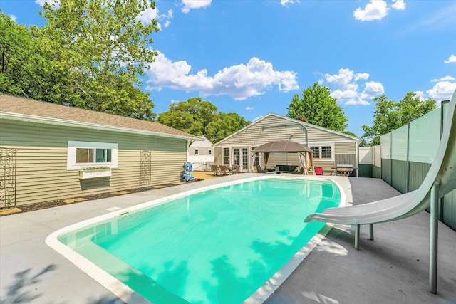411 Hessel Blvd, Champaign, IL 61820 - view of swimming pool with a gazebo, a water slide, and a patio area
