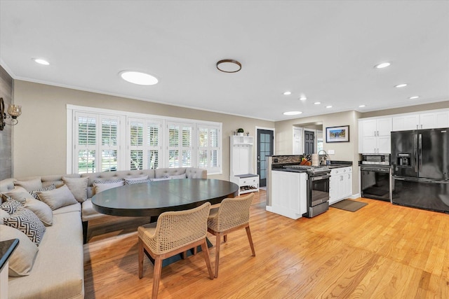 411 Hessel Blvd, Champaign, IL 61820 - dining area with ornamental molding, light wood-style floors, and recessed lighting