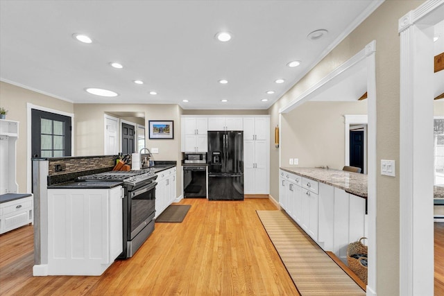 411 Hessel Blvd, Champaign, IL 61820 - kitchen with black appliances, ornamental molding, white cabinets, light wood-type flooring, and recessed lighting