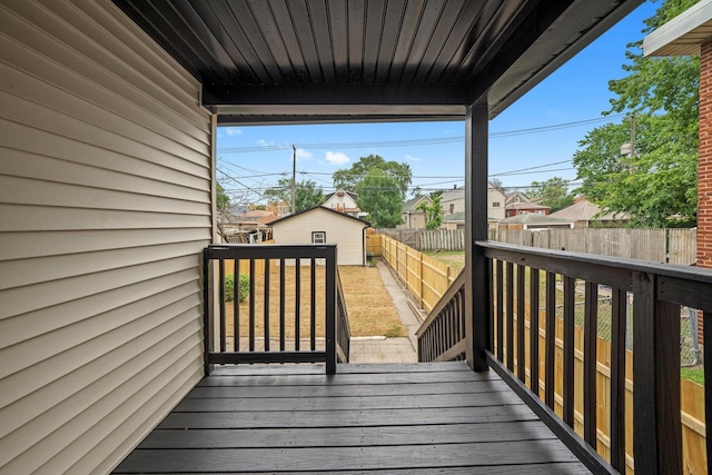 10823 S Ewing Ave, Chicago, IL 60617 - deck with a fenced backyard, a storage shed, and a residential view