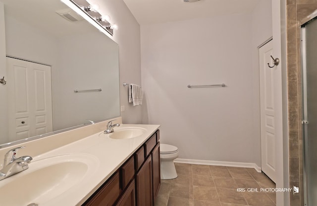 1114 Barkston Ln, Aurora, IL 60502 - bathroom featuring double vanity, an enclosed shower, and tile patterned flooring