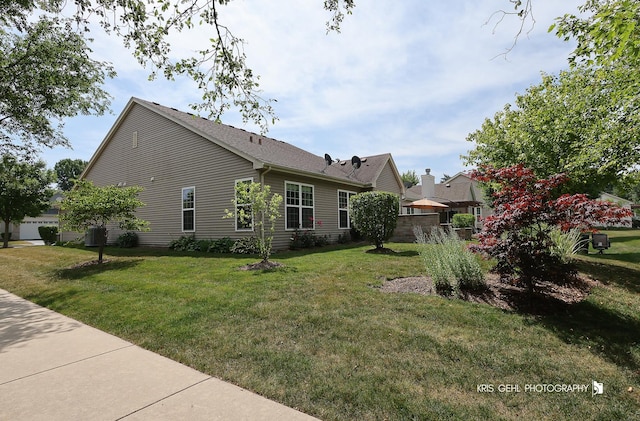 1114 Barkston Ln, Aurora, IL 60502 - view of property exterior featuring a lawn