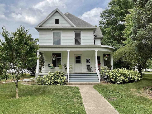 108 N Walnut St, Lindenwood, IL 61049 - view of front of property featuring a porch, a front yard, and a shingled roof
