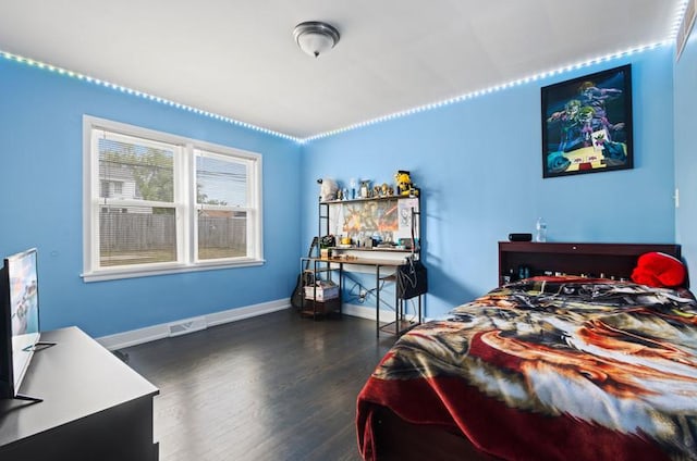 251 W 10th St, Chicago Heights, IL 60411 - bedroom featuring wood finished floors and baseboards