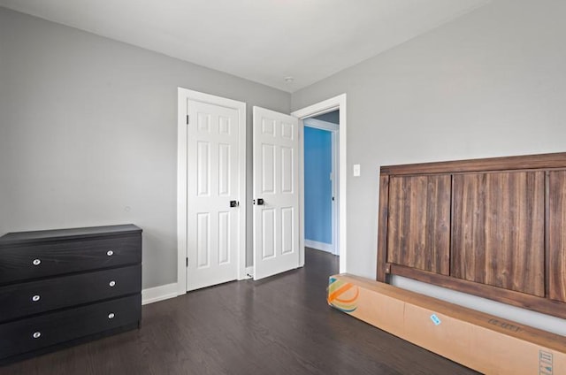 251 W 10th St, Chicago Heights, IL 60411 - bedroom with dark wood finished floors and baseboards