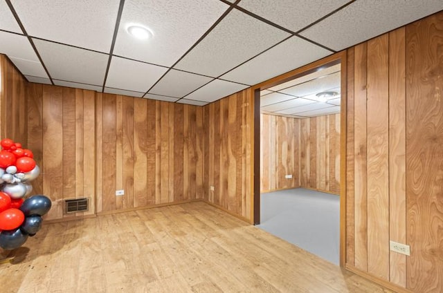 251 W 10th St, Chicago Heights, IL 60411 - additional living space featuring wood walls and wood finished floors