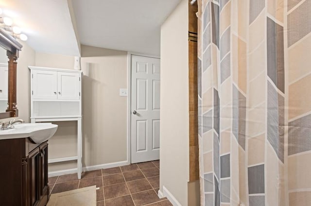 251 W 10th St, Chicago Heights, IL 60411 - bathroom featuring vanity, a shower, and tile patterned flooring