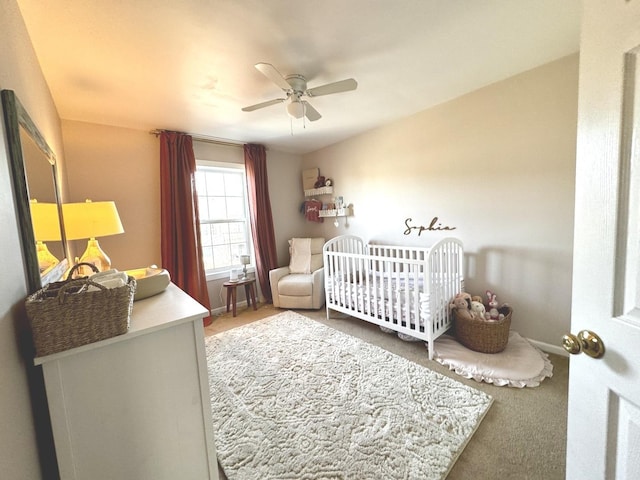 1321 Acorn Dr, Crest Hill, IL 60403 - carpeted bedroom featuring a nursery area and ceiling fan