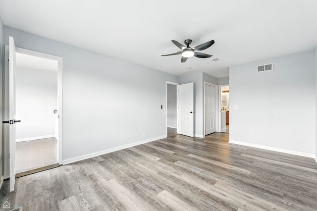 13636 Savanna Dr, Plainfield, IL 60544 - unfurnished bedroom with wood finished floors and a ceiling fan