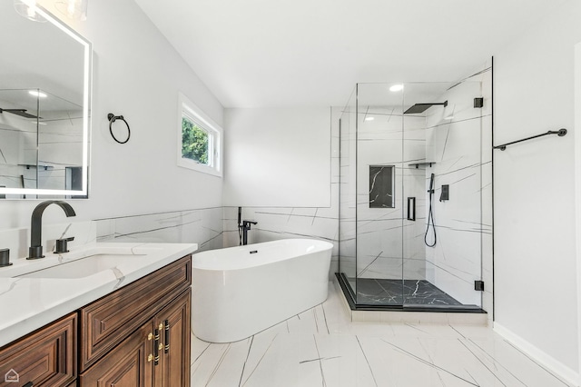 13636 Savanna Dr, Plainfield, IL 60544 - bathroom featuring a marble finish shower, a soaking tub, vanity, marble finish flooring, and recessed lighting