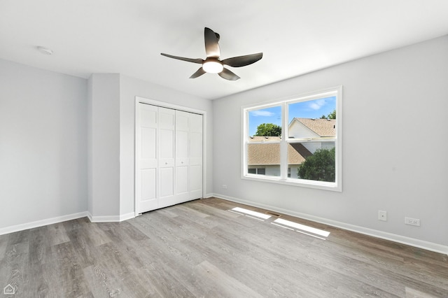 13636 Savanna Dr, Plainfield, IL 60544 - unfurnished bedroom featuring wood finished floors, a closet, and ceiling fan