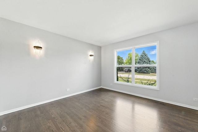 13636 Savanna Dr, Plainfield, IL 60544 - spare room featuring dark wood-type flooring