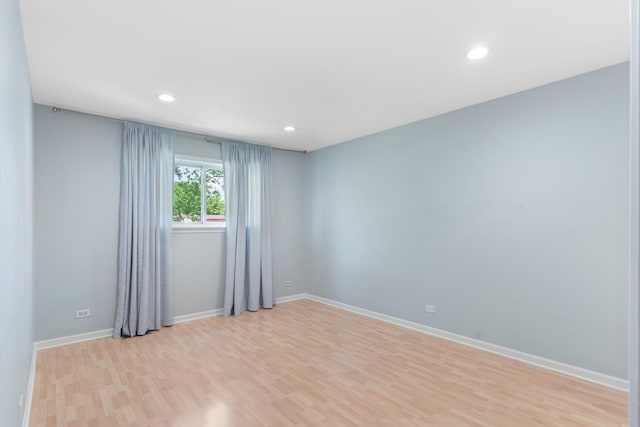 496 Navajo Trl S Unit 496, Wheeling, IL 60090 - spare room with light wood-style flooring and recessed lighting