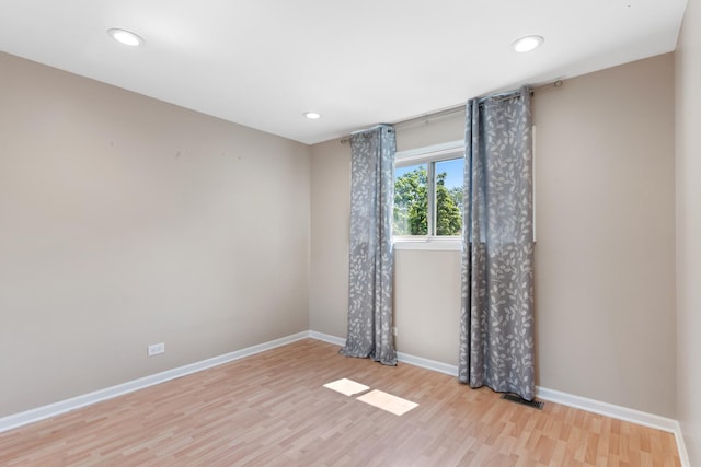 496 Navajo Trl S Unit 496, Wheeling, IL 60090 - spare room with wood finished floors and recessed lighting