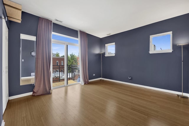 1414 S Halsted St Unit 3A, Chicago, IL 60607 - unfurnished room with baseboards and wood finished floors