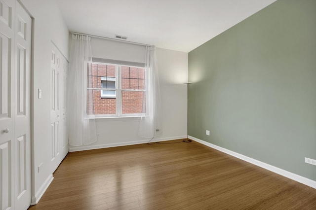 1414 S Halsted St Unit 3A, Chicago, IL 60607 - unfurnished bedroom featuring wood finished floors and baseboards