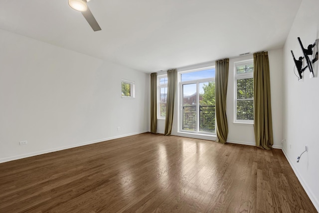 1414 S Halsted St Unit 3A, Chicago, IL 60607 - spare room with healthy amount of natural light, wood finished floors, and a ceiling fan