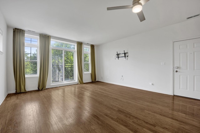 1414 S Halsted St Unit 3A, Chicago, IL 60607 - empty room with wood finished floors and a ceiling fan