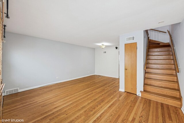 337 Wesley Ave Unit C, Oak Park, IL 60302 - basement featuring stairs and light wood-type flooring