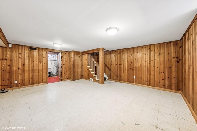 337 Wesley Ave Unit C, Oak Park, IL 60302 - finished below grade area featuring wooden walls, stairway, and tile patterned floors