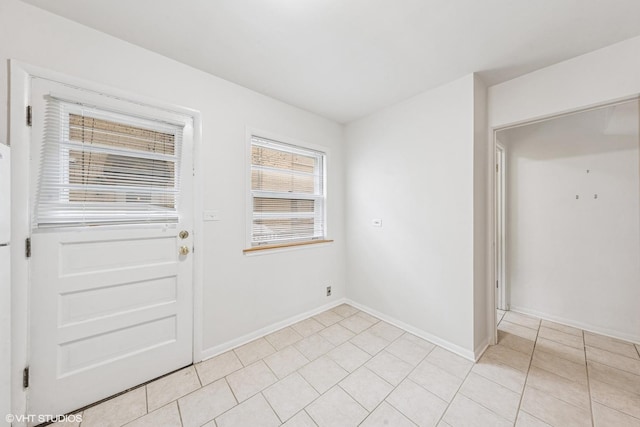 337 Wesley Ave Unit C, Oak Park, IL 60302 - doorway to outside with light tile patterned floors and baseboards