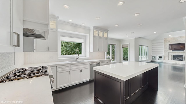 392 Spruce Rd, Wood Dale, IL 60191 - kitchen with dishwasher, light countertops, white cabinets, a center island, and recessed lighting