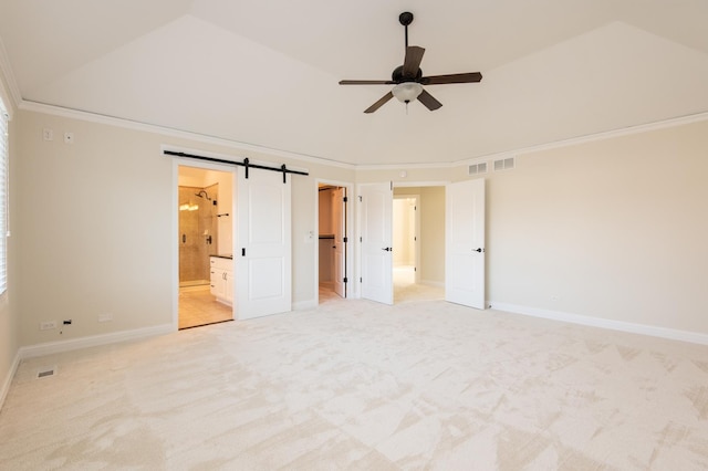 392 Spruce Rd, Wood Dale, IL 60191 - unfurnished bedroom with light colored carpet, connected bathroom, crown molding, a spacious closet, and lofted ceiling