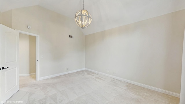 392 Spruce Rd, Wood Dale, IL 60191 - unfurnished room with lofted ceiling, light carpet, and a chandelier