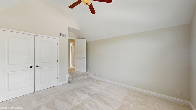 392 Spruce Rd, Wood Dale, IL 60191 - unfurnished bedroom with vaulted ceiling, a closet, light carpet, and ceiling fan
