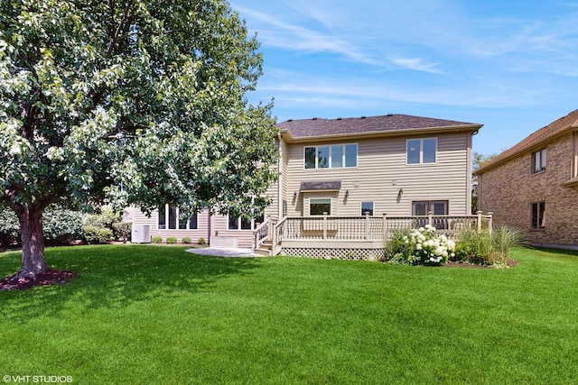 392 Spruce Rd, Wood Dale, IL 60191 - back of house with a wooden deck and a lawn
