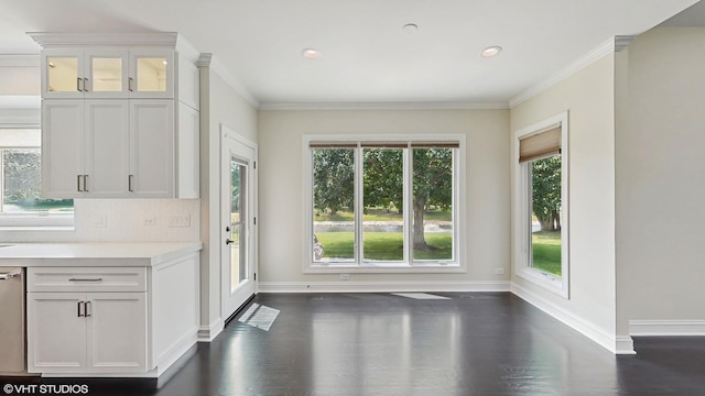 392 Spruce Rd, Wood Dale, IL 60191 - unfurnished dining area with dark wood finished floors, ornamental molding, and recessed lighting