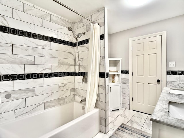 120 Walter Ct, Bloomingdale, IL 60108 - bathroom with marble look tile flooring, shower / bath combination with curtain, double vanity, wainscoting, and tile walls